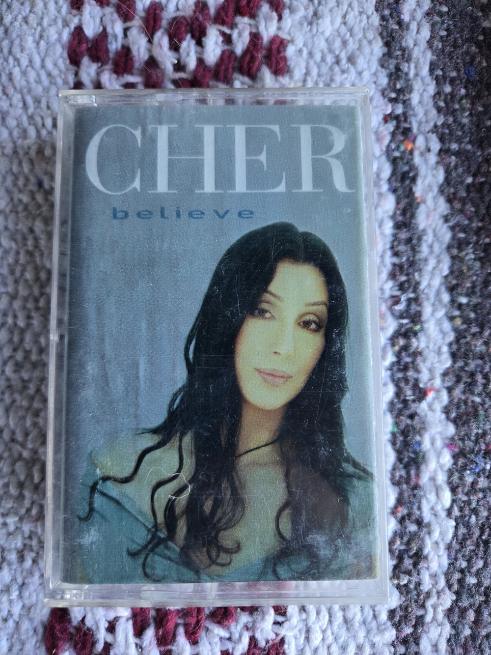 Believe Cassette Tape - Teal Cover with Black Hair Portrait